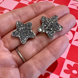 Silver glitter star earrings